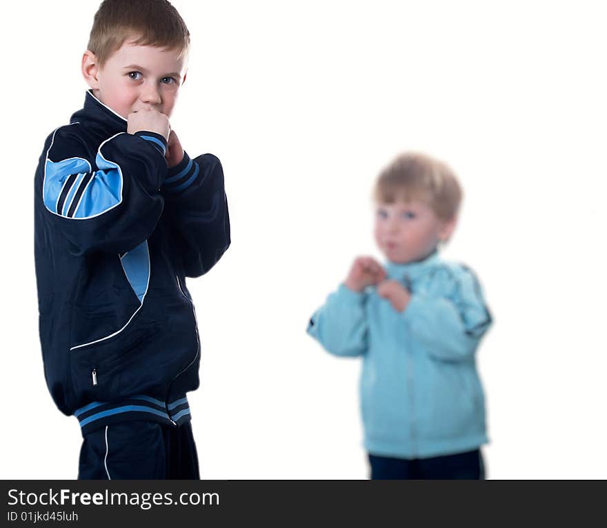 Two small boys cost in a boxing rack