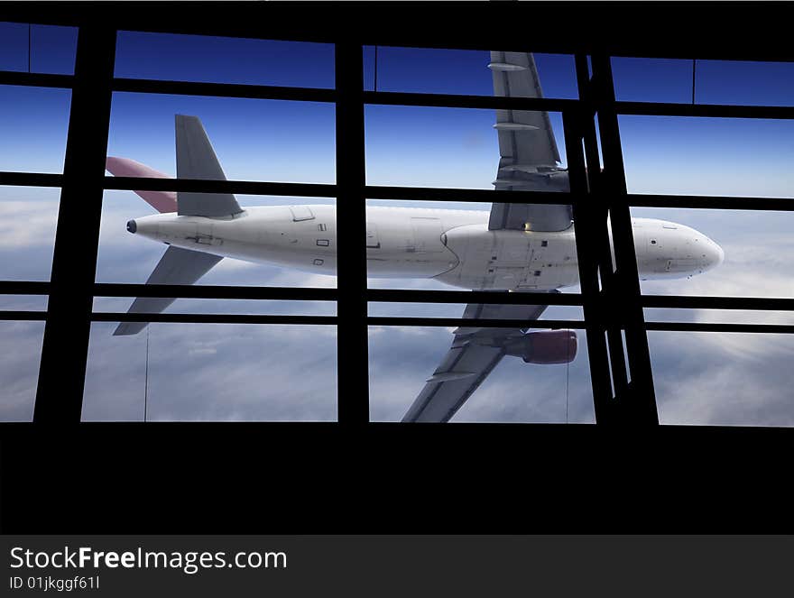 The airplane on the blue sky background. The airplane on the blue sky background.