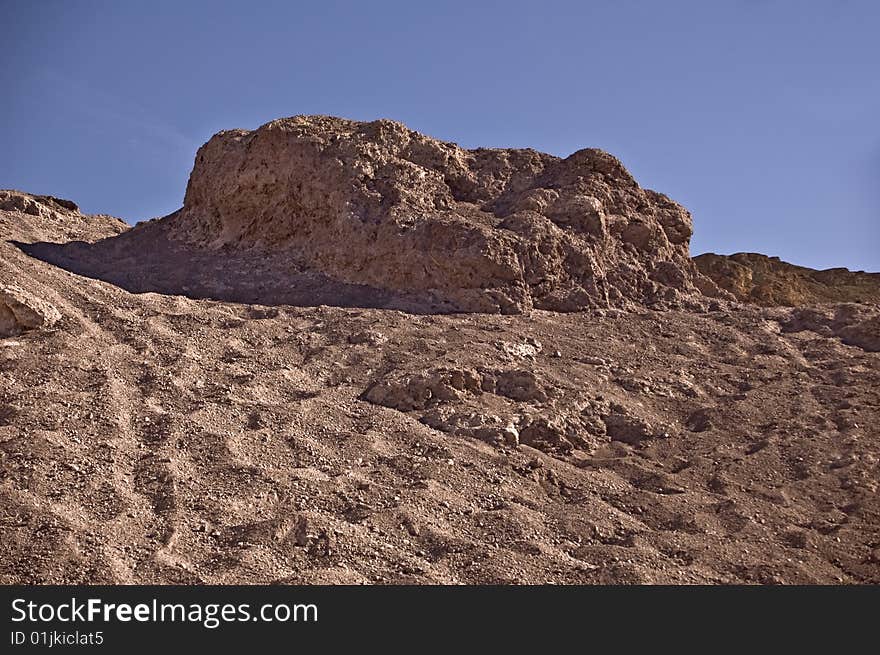 This the picture of a large boulder at Death Valley National Park. This the picture of a large boulder at Death Valley National Park.