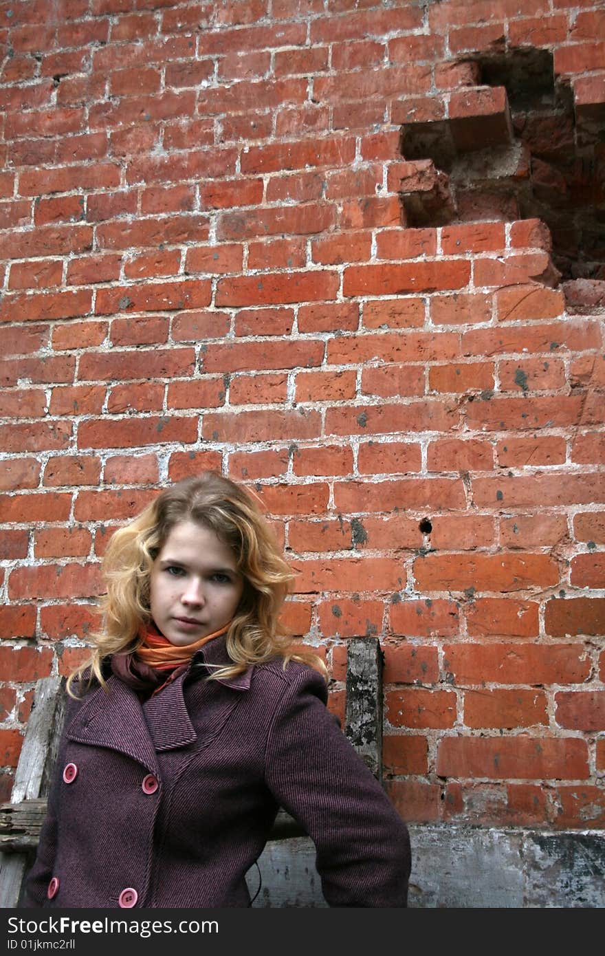 Girl walking in industrial area