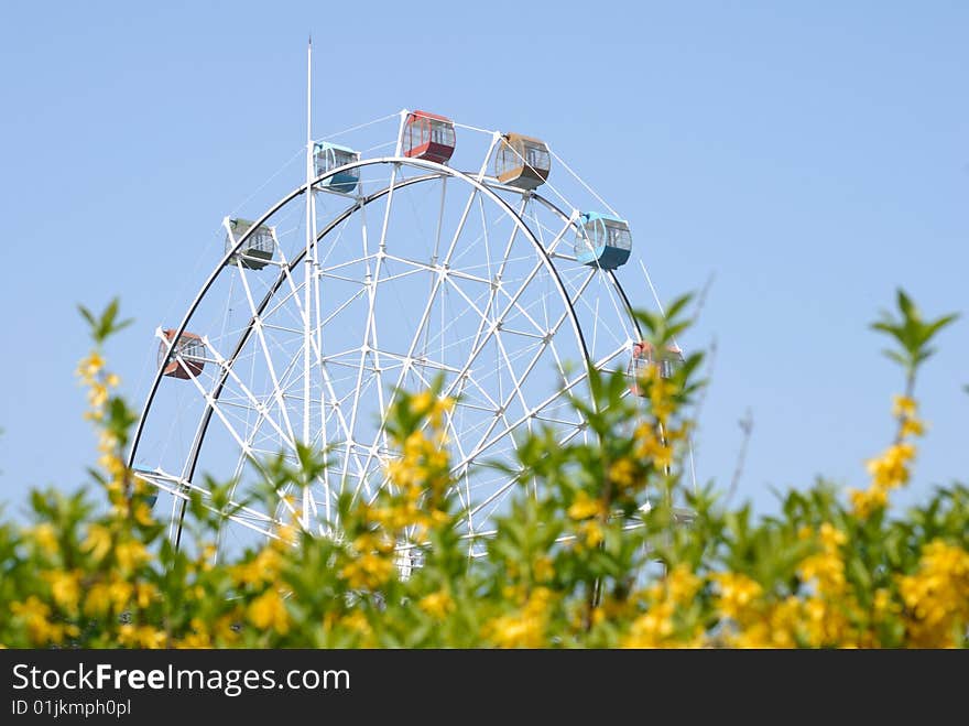 Big wheel with blue sky background