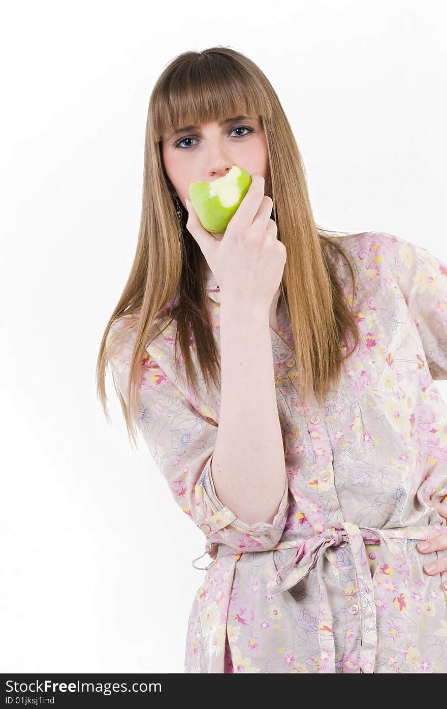 Young blue eyes girl with green apple. Young blue eyes girl with green apple.