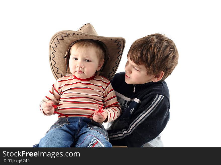 Two little boys (brothers) isolated on white background