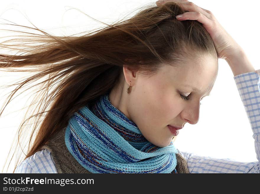 Young woman wrap up into scarf isolated on white background