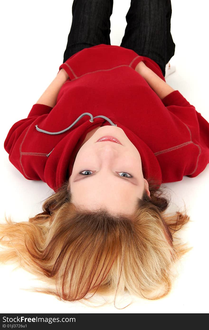 Young girl is lying on white background. Young girl is lying on white background