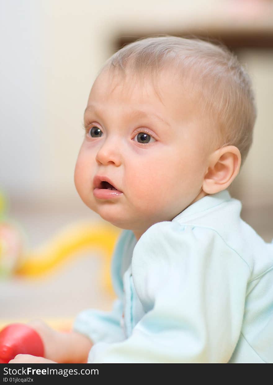 Interested adorable baby close-up - shallow DOF