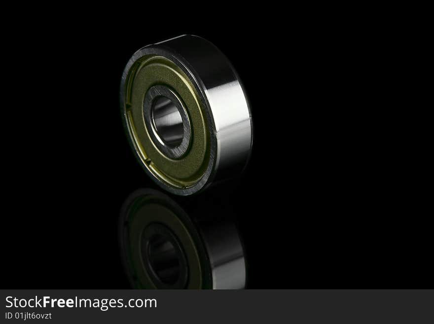 The ball bearing on a black background. The ball bearing on a black background