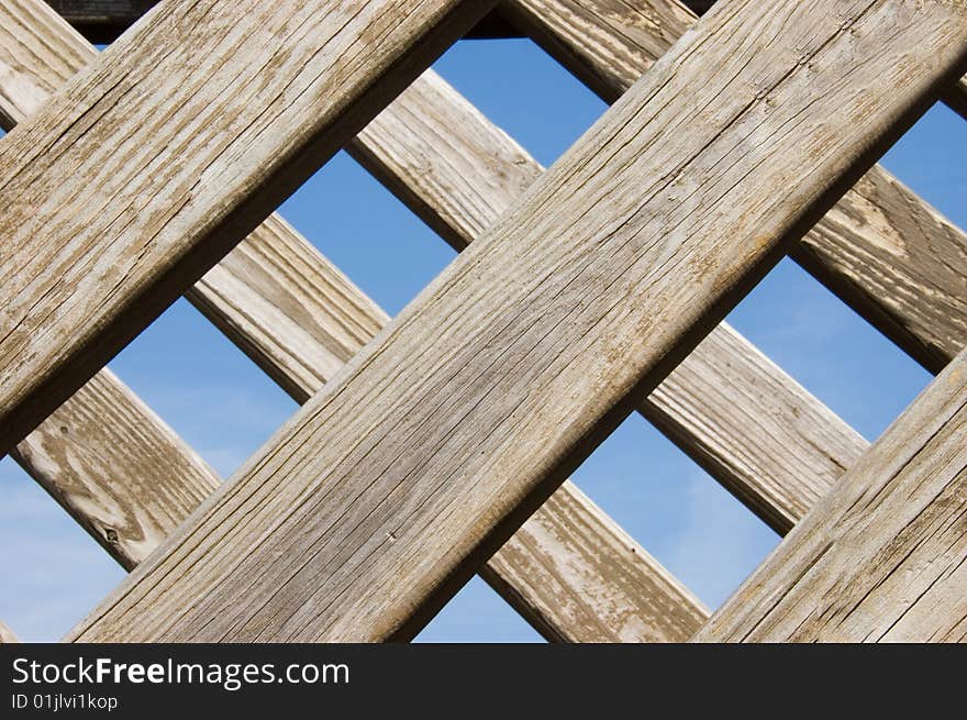 Wooden slats against a blue sky