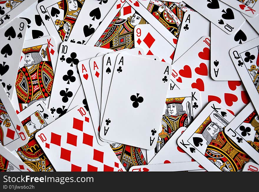 Four aces on a  playing cards background