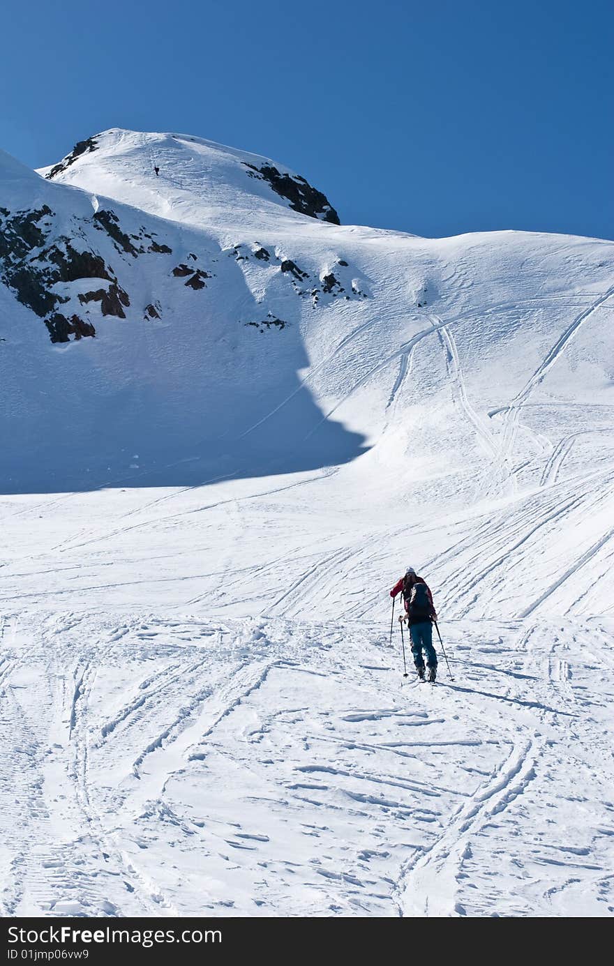 Ski mountaineering or cross country skiing in Italian Alps. Ski mountaineering or cross country skiing in Italian Alps