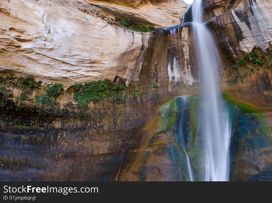 Waterfall Against Red Rock