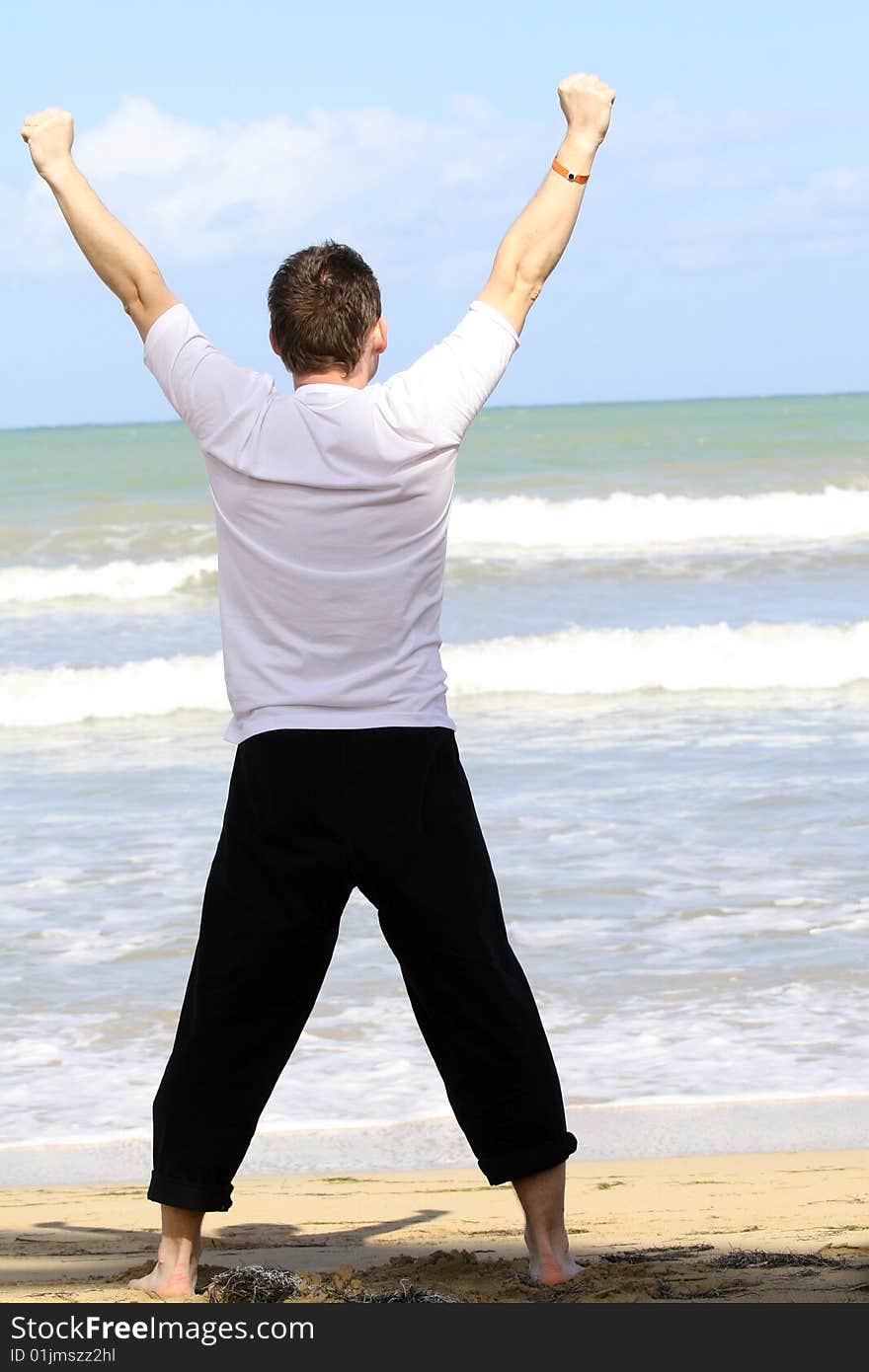 Man Doing Sport On The Beach