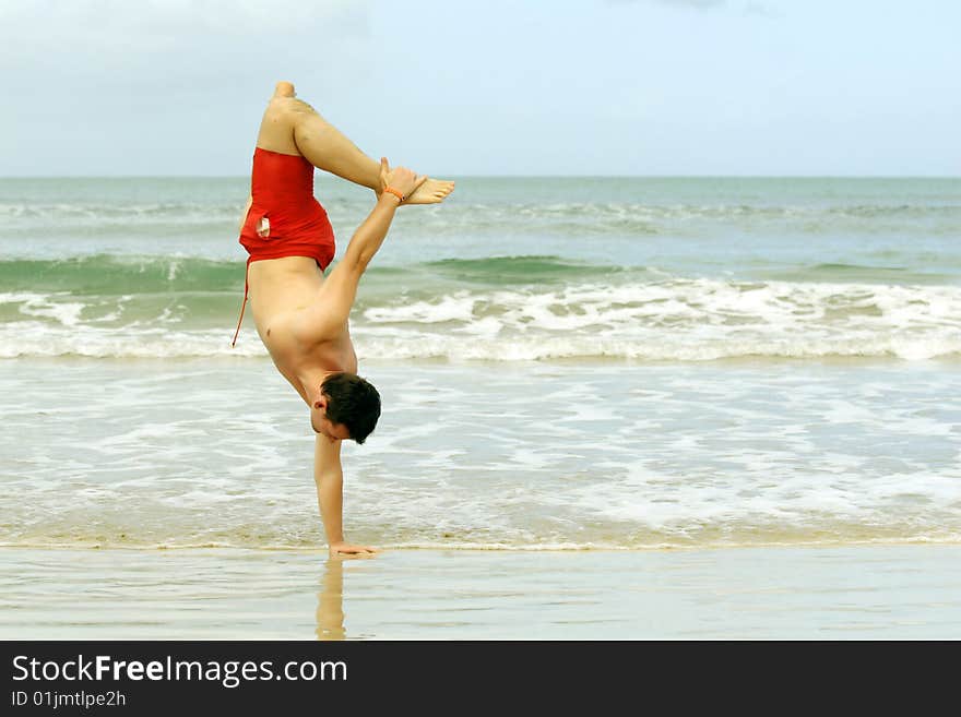 Handstand on the beach