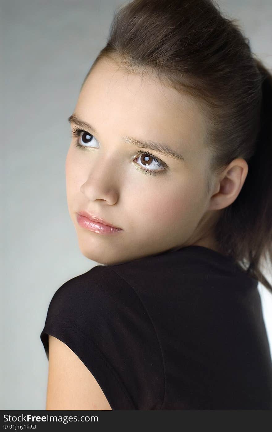 Beautiful young girl portrait in studio