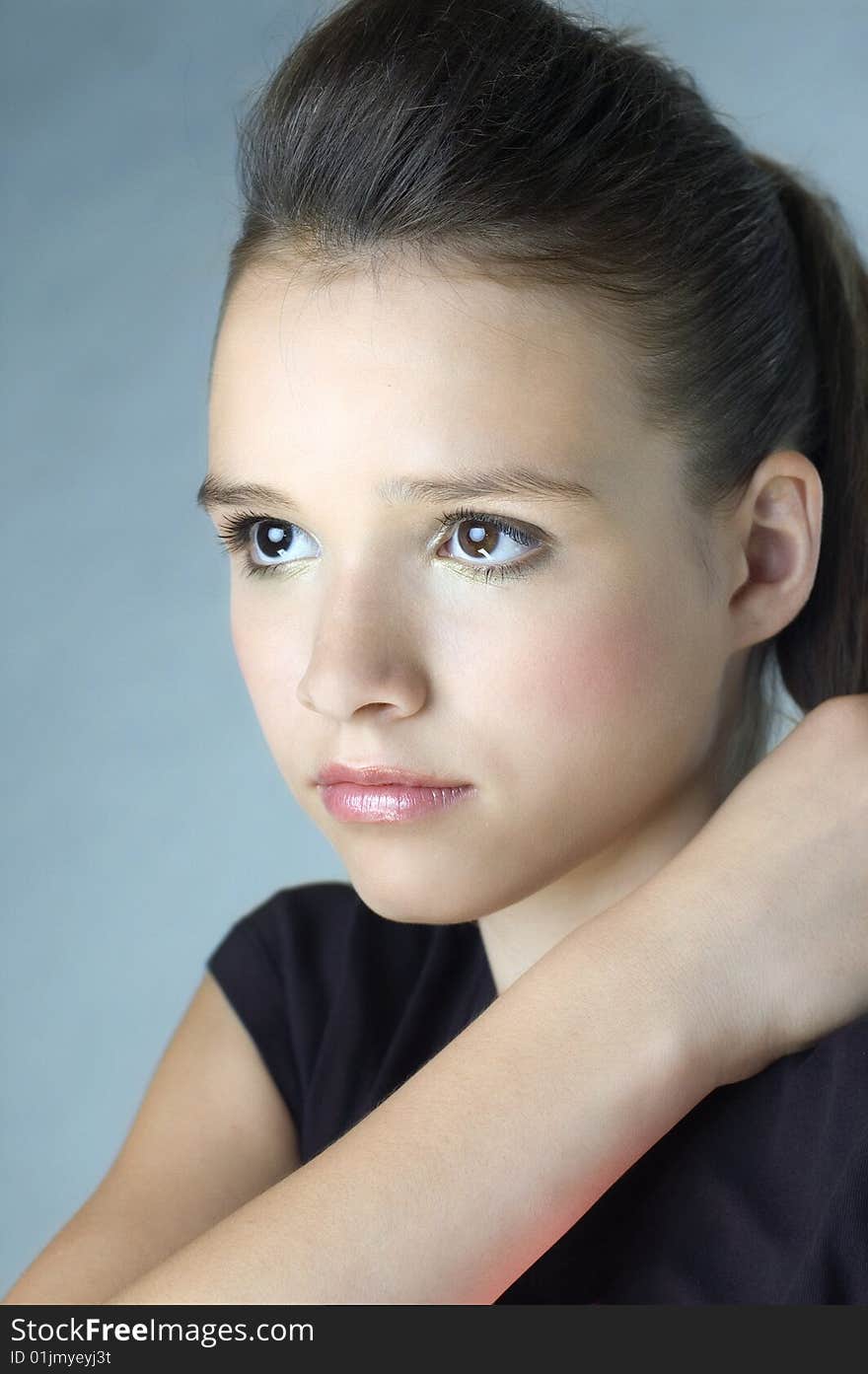 Beautiful young girl portrait in studio