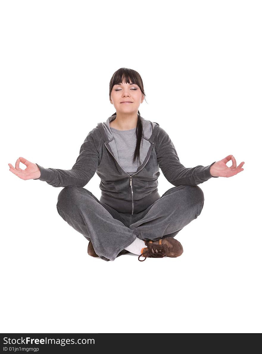 Attractive brunette woman doing exercise. over white background