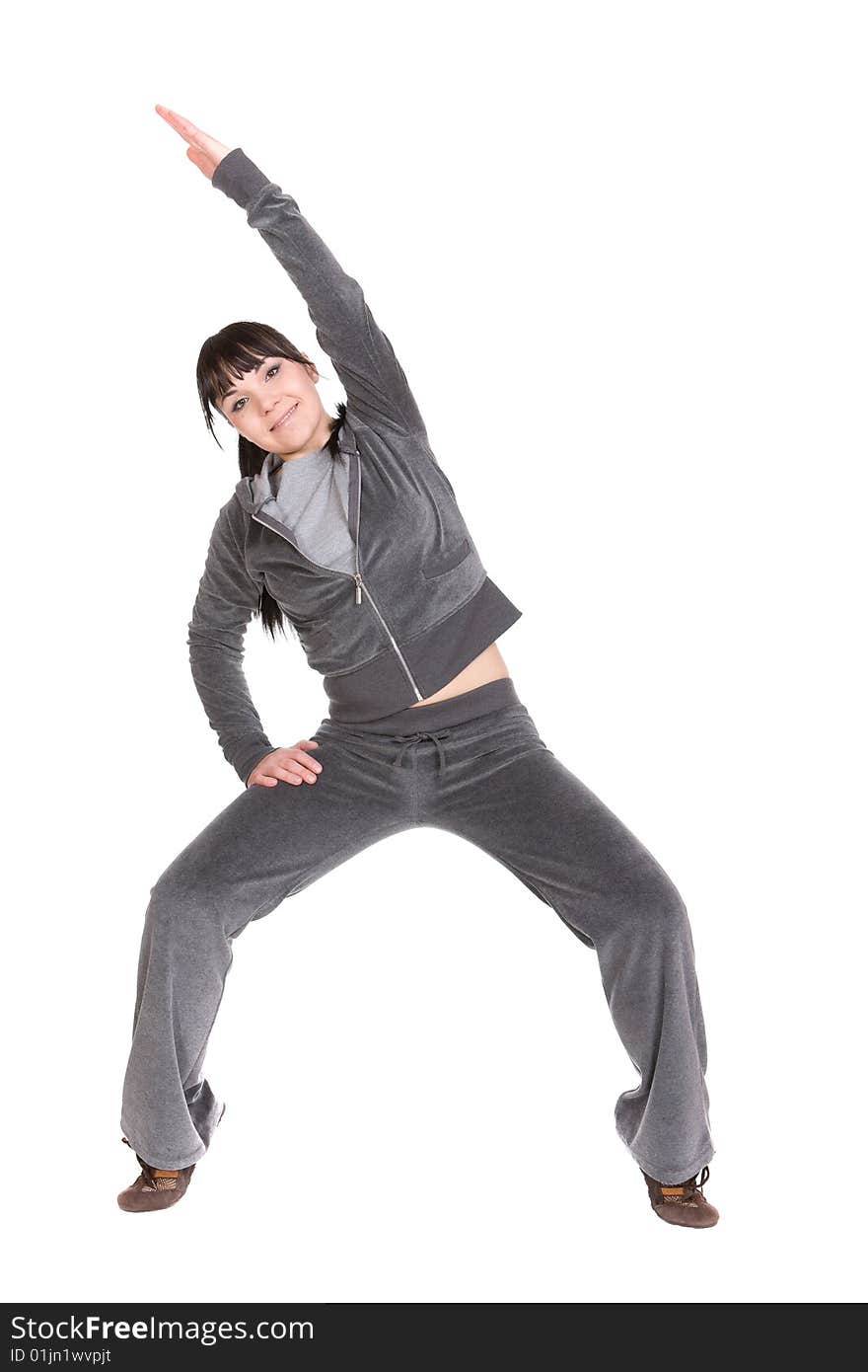 Attractive brunette woman doing exercise. over white background