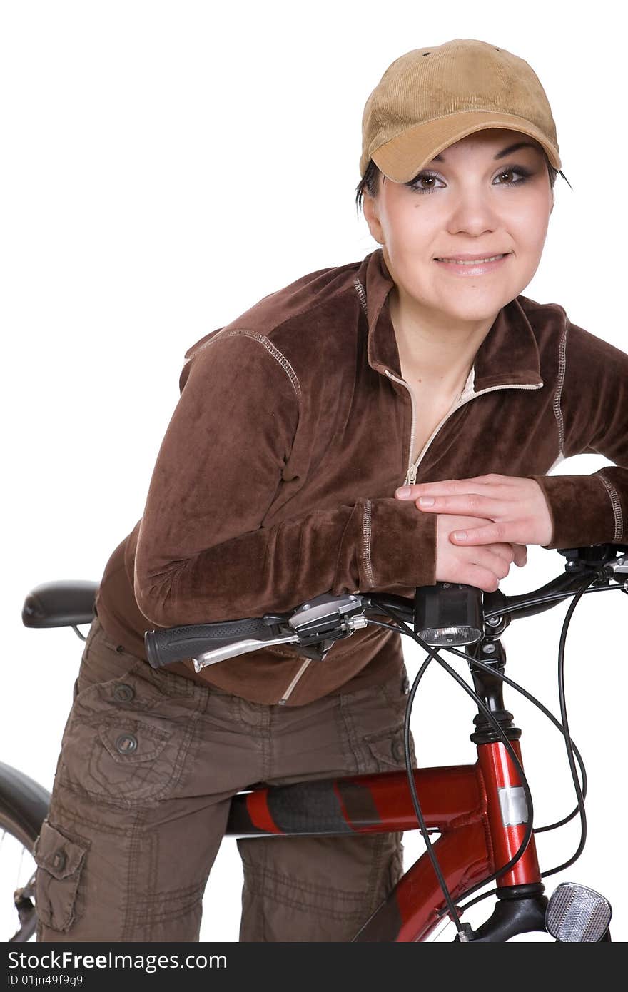 Attractive brunette woman with bike. over white background. Attractive brunette woman with bike. over white background