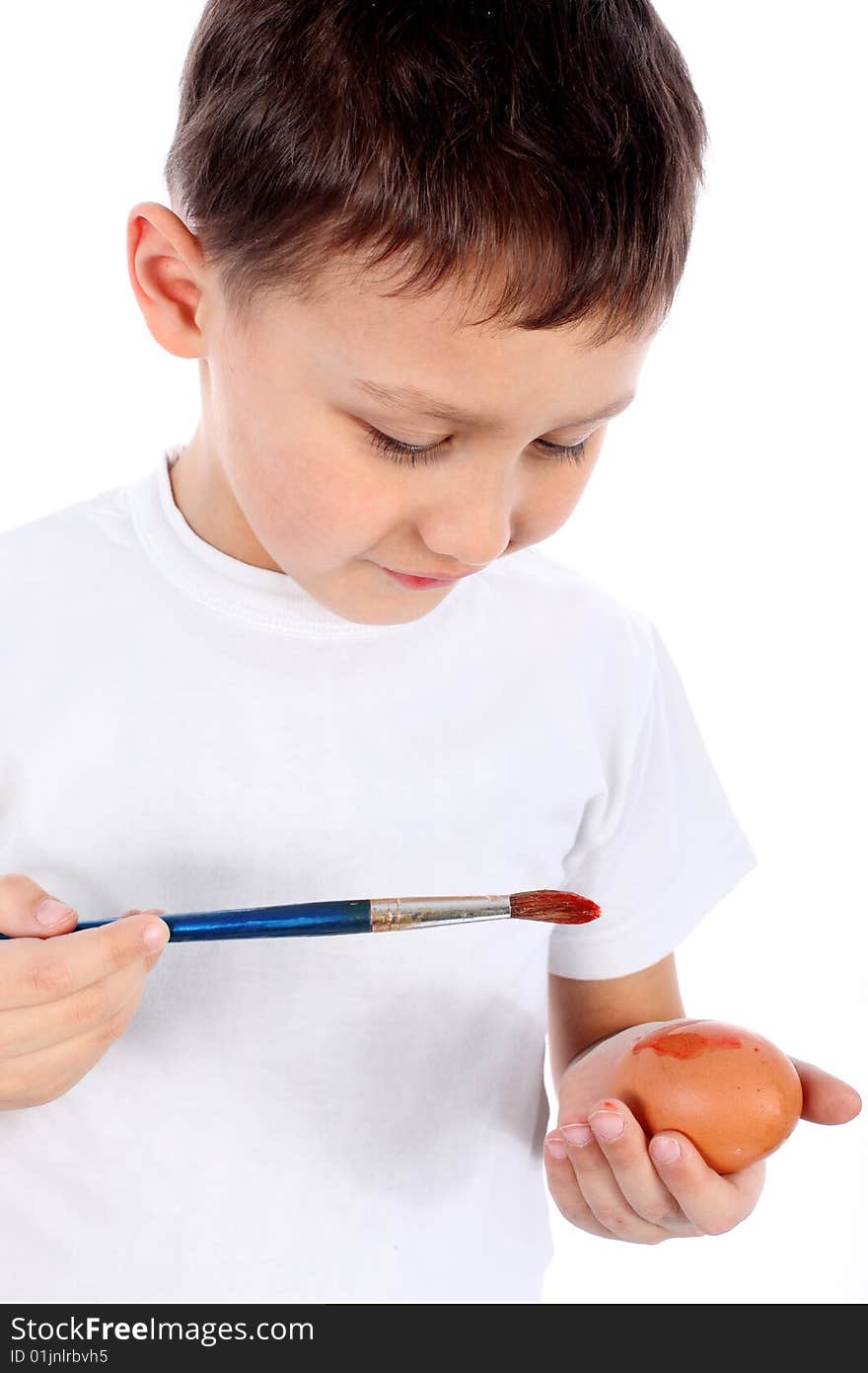 boy painting easter egg