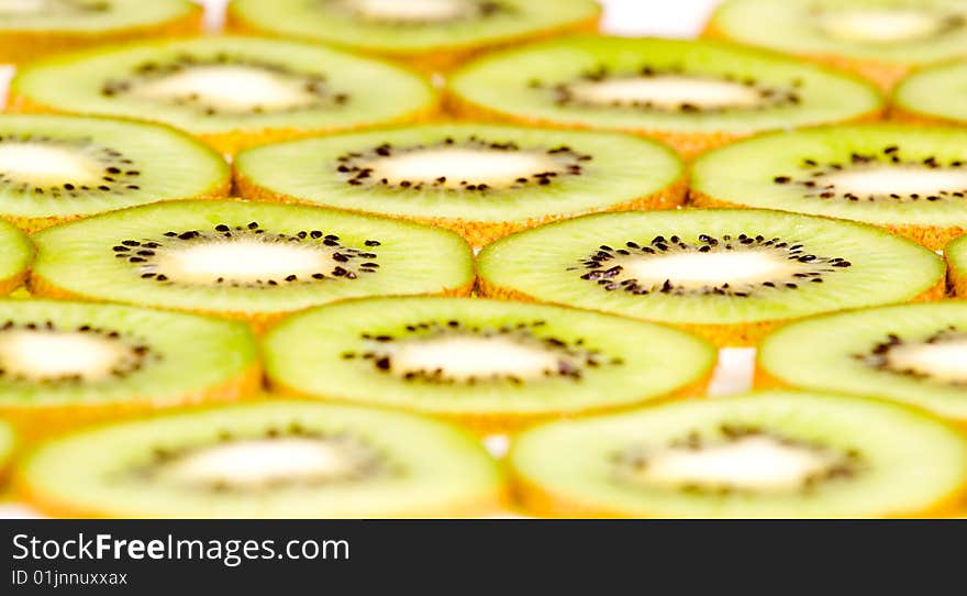 The kiwi slices on white closeup