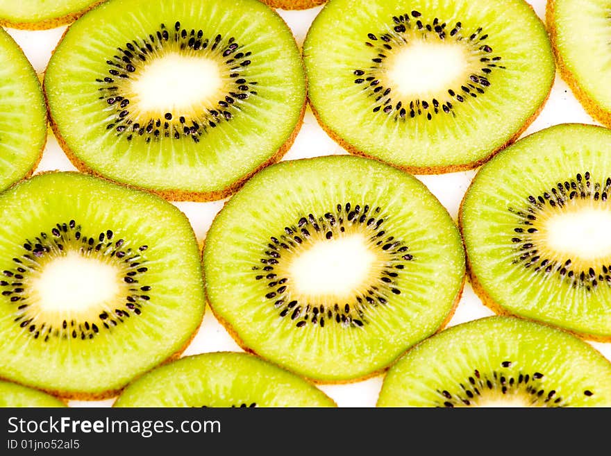 The kiwi slices on white closeup