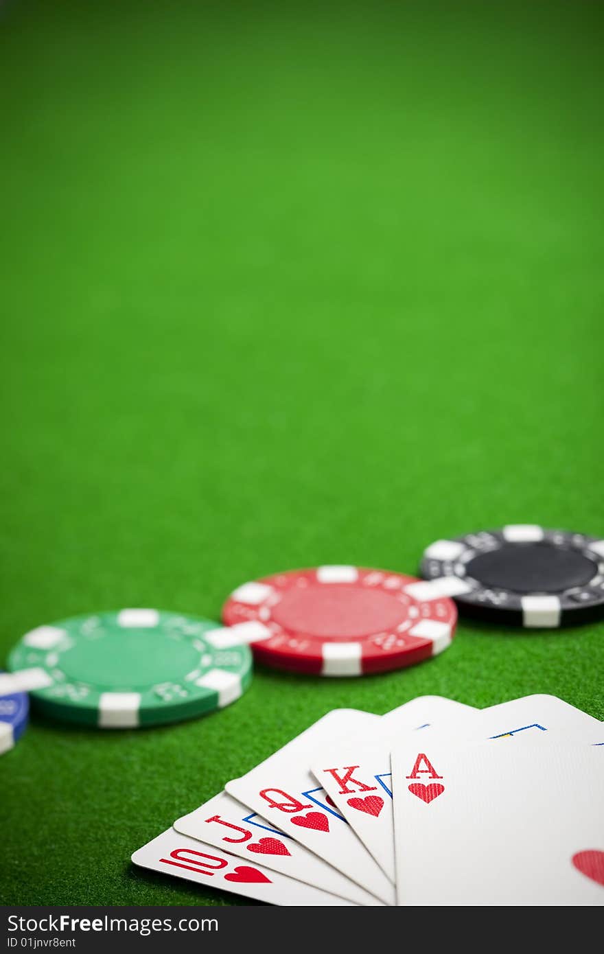 Playing poker in the casino with winning hand