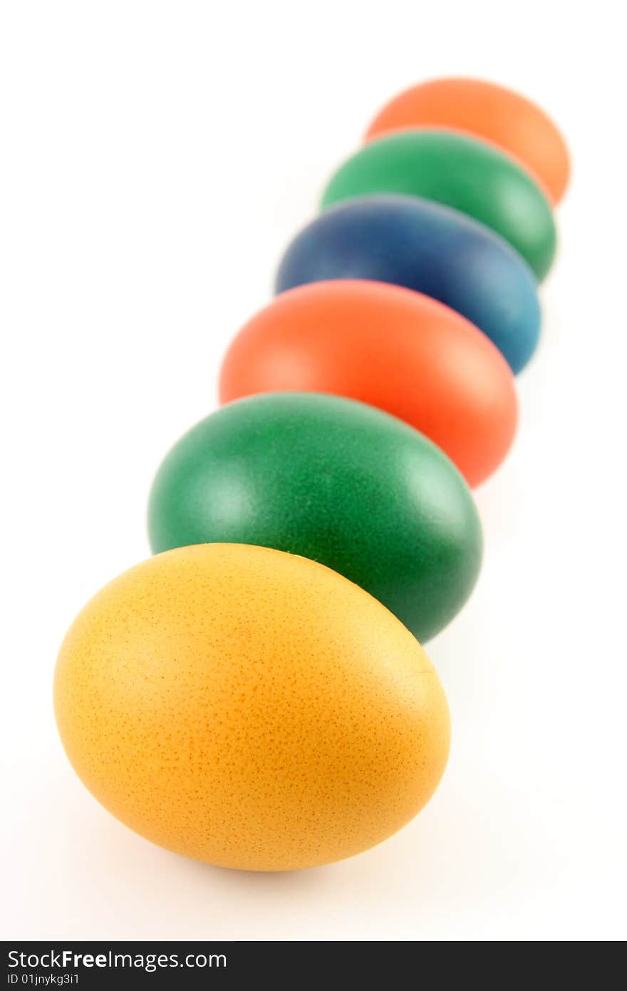 Six colored eggs isolated over white background. Six colored eggs isolated over white background