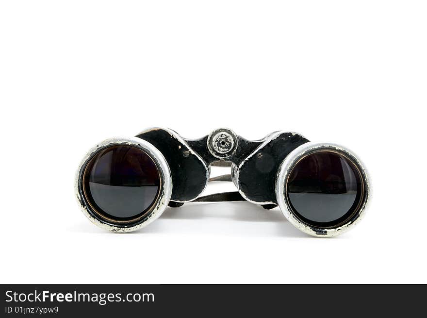 The Old Black Binoculars On A White Background