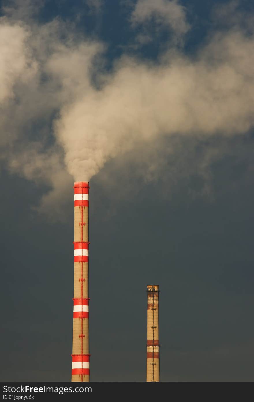 Exhaust and clouds of smoke in sky. Exhaust and clouds of smoke in sky