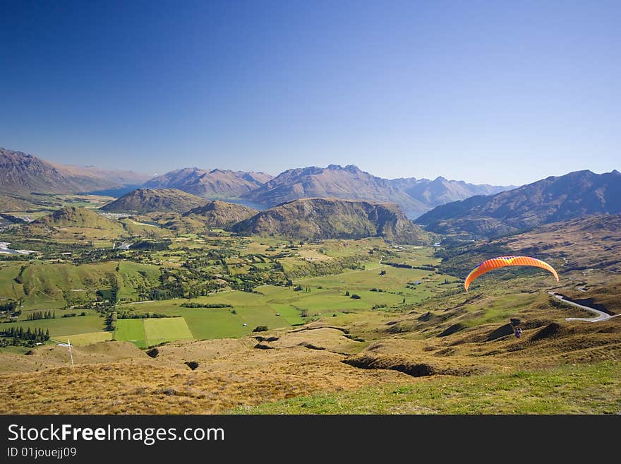 Paraglider In The Mountains