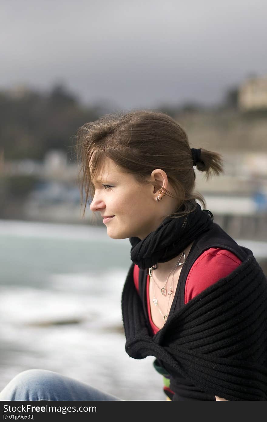 Portrait of a nice russian girl widh pony tail looking at the horizon. Portrait of a nice russian girl widh pony tail looking at the horizon