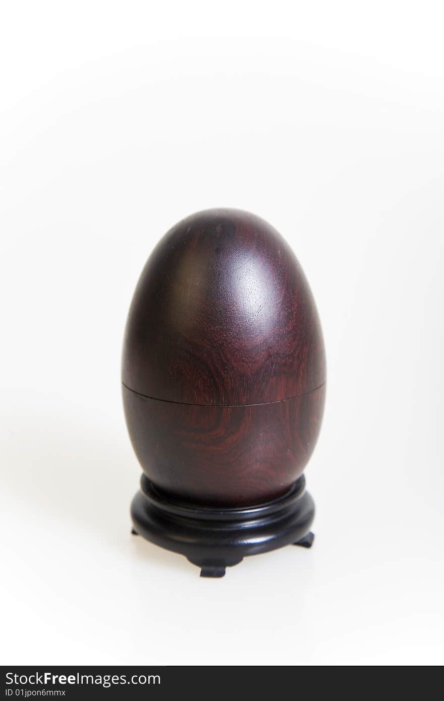 Empty wooden egg on white background,(jewelry box)