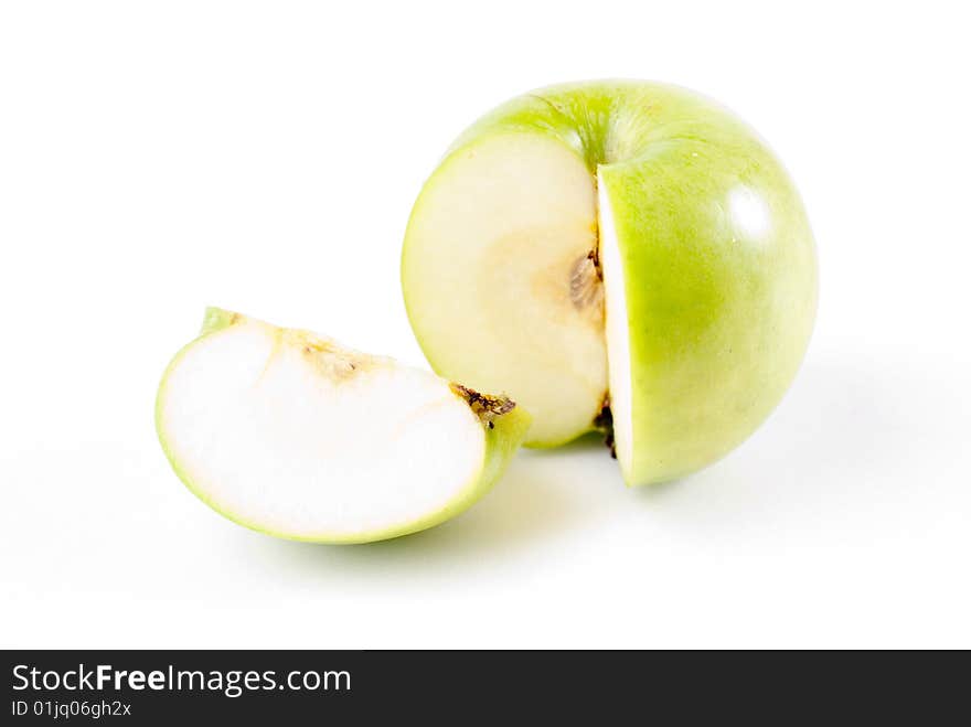 Green apple sliced and isolated on white