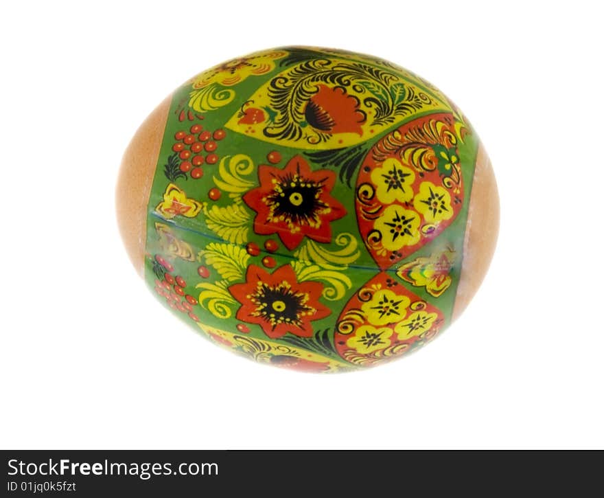 Easter painted egg covered by lacquer and ornamented by miniature painting which is origin from the Russian art. Isolated over white background