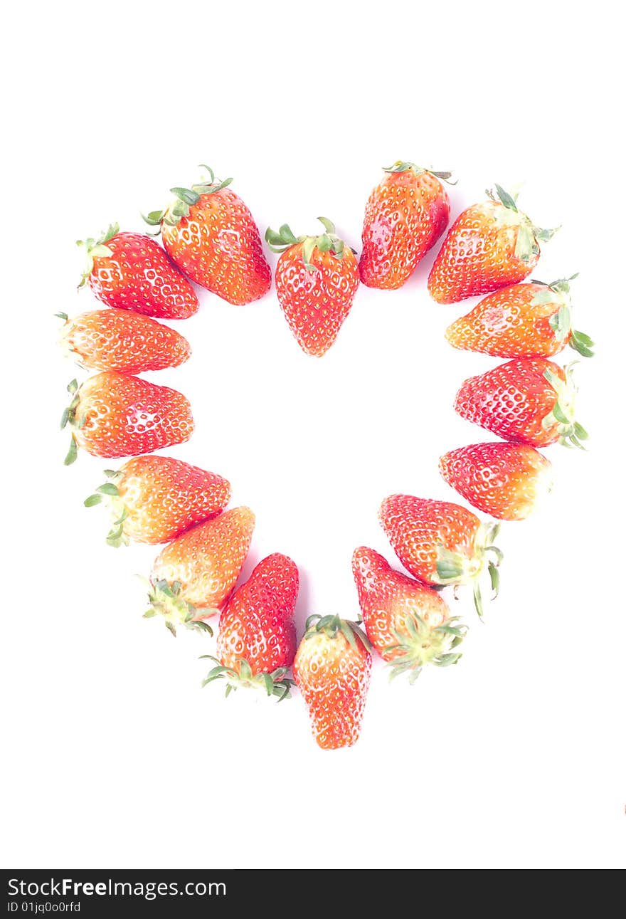 Fresh juicy strawberry isolated on white with heart shape