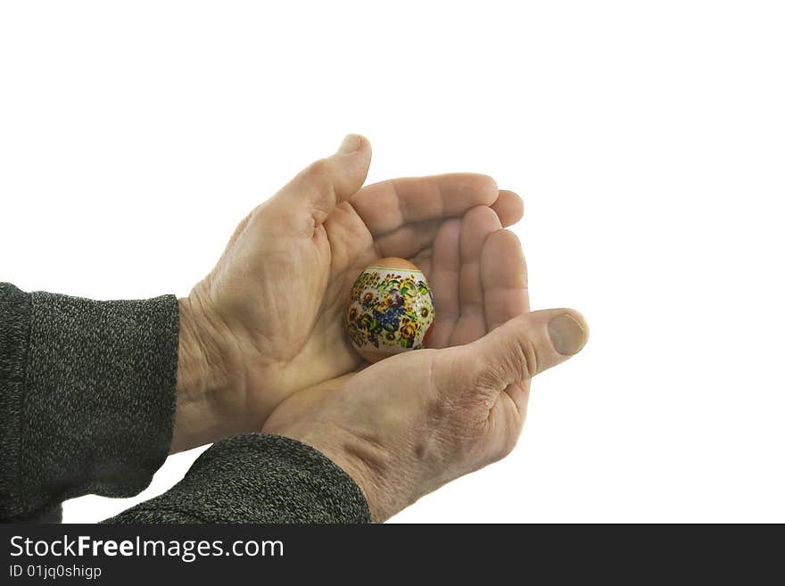 Man hands hold decorated easter egg isolated over white background