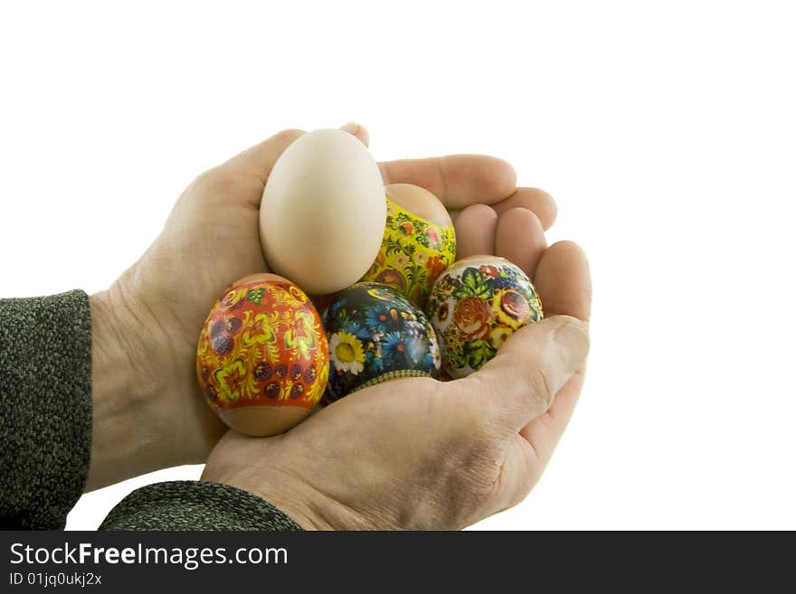 Man hands hold decorated easter eggs isolated over white background. Man hands hold decorated easter eggs isolated over white background