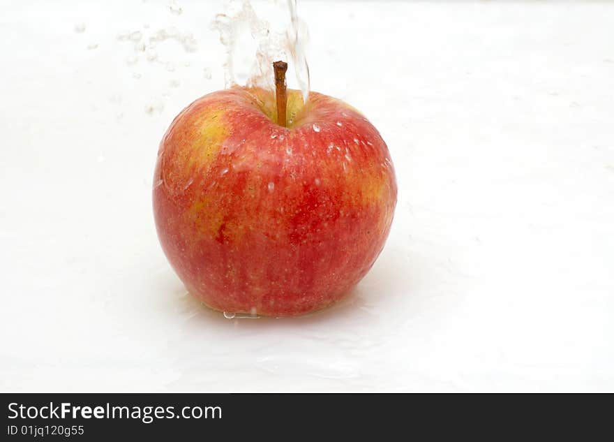 Water splash on an apple.