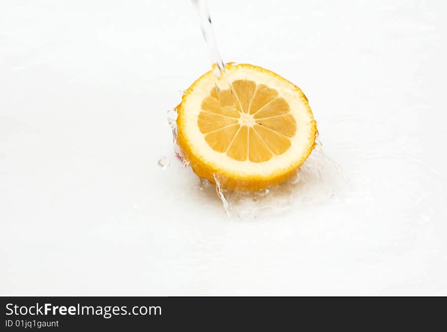 Water Splash On A Fresh,juicy Lemon.