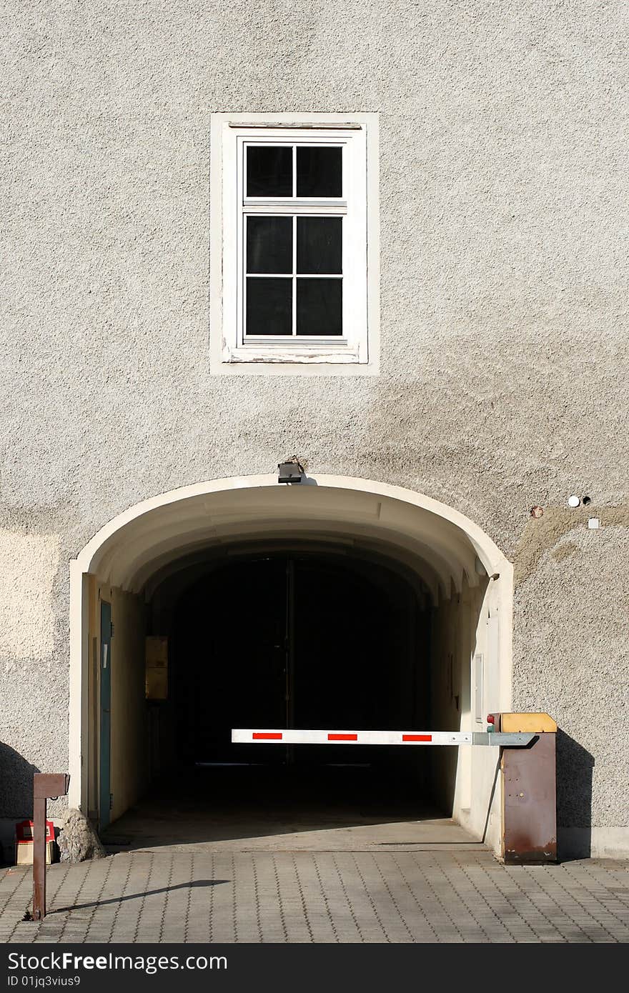 Closed security barrier that prohibits entry to a gate. Closed security barrier that prohibits entry to a gate