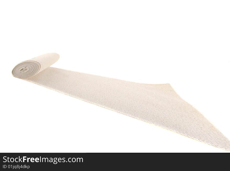 Bundled medical bandage on a white background