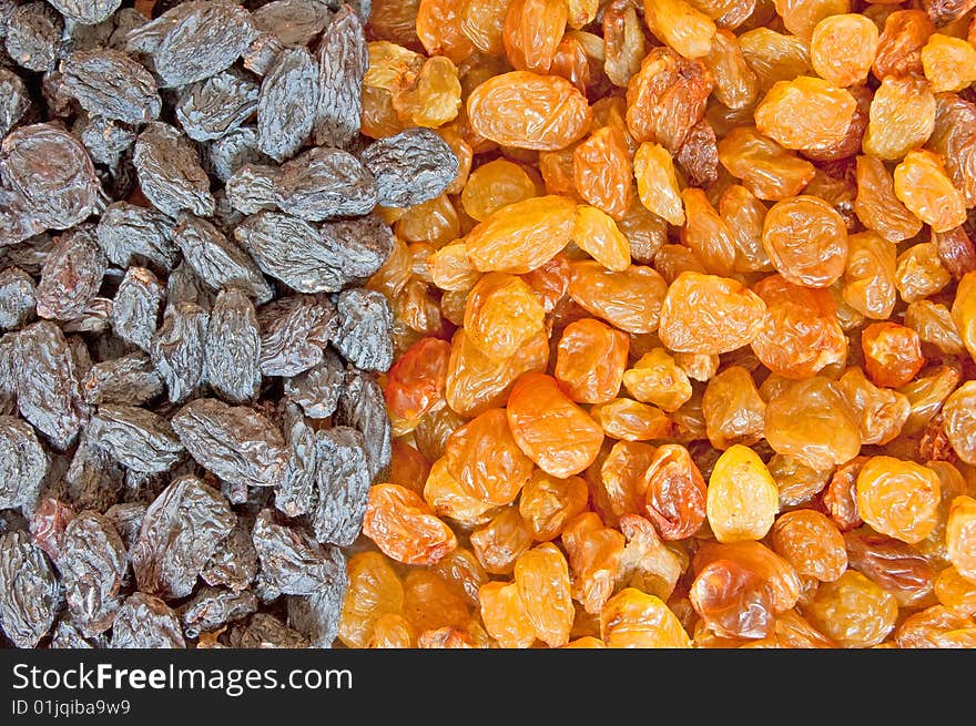 Juicy raisins, two-colour food background