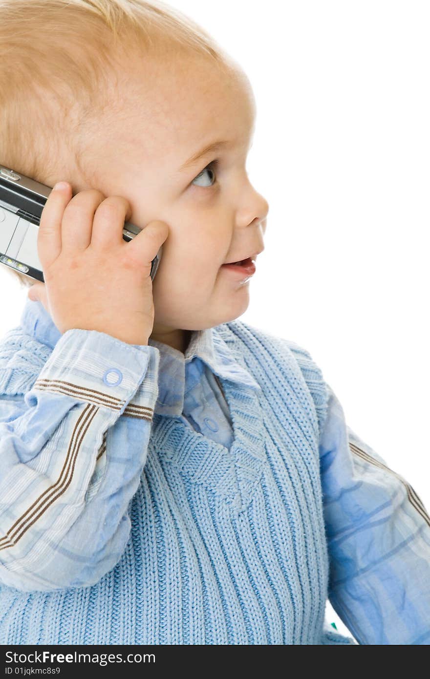 Concept of little businessman. Child speak on the phone. Isolated on white background