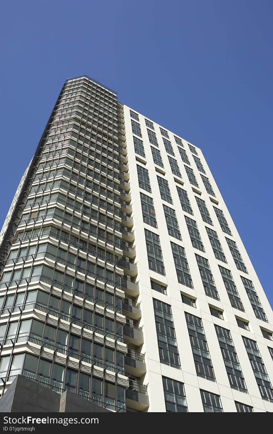 Office building in blue sky