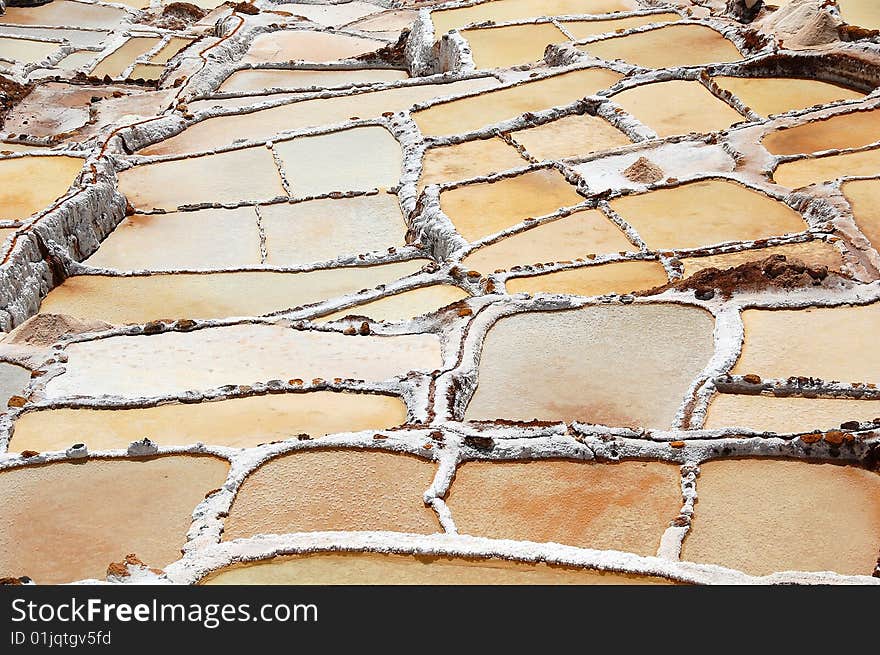 Since pre-Inca times, salt has been obtained in Maras by evaporating salty water (provided by a nearby subterranean stream) in the sun, leaving the salt behind. In the mines there are thousands of salt-pools; when light is reflected there the effect is said to be quite stunning. Since pre-Inca times, salt has been obtained in Maras by evaporating salty water (provided by a nearby subterranean stream) in the sun, leaving the salt behind. In the mines there are thousands of salt-pools; when light is reflected there the effect is said to be quite stunning.