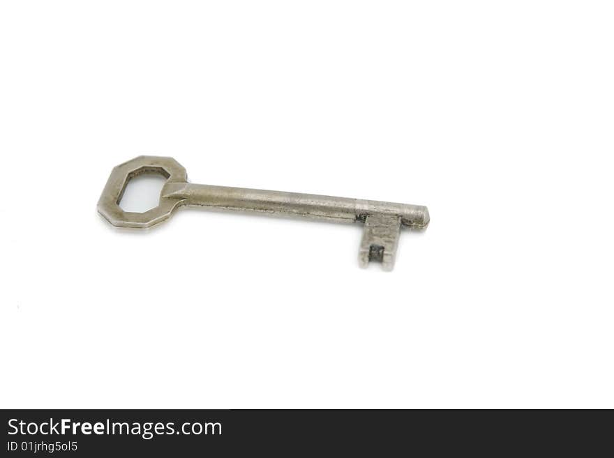 An old silver key isolated on white background