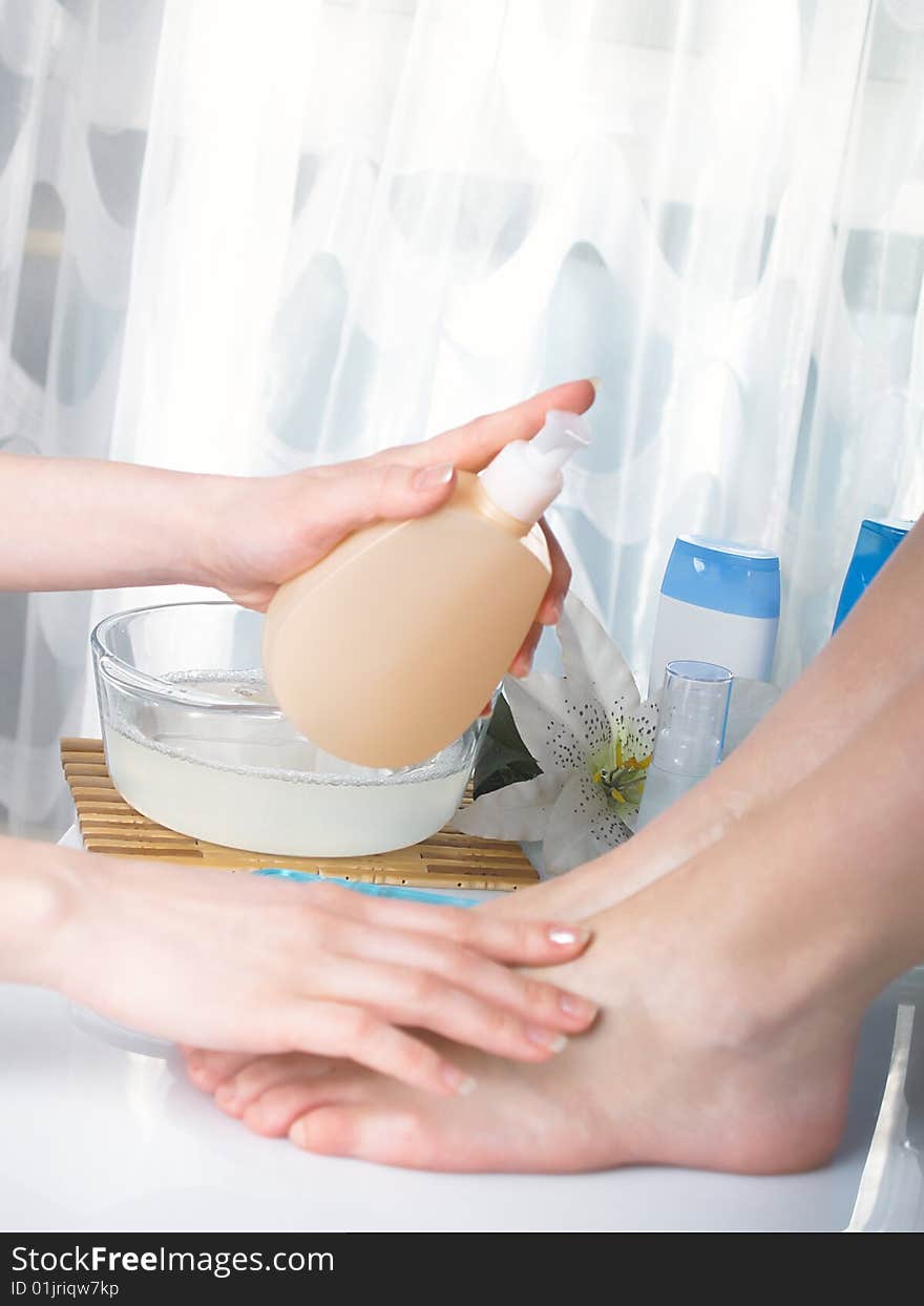 Washing of a female leg in capacity with water