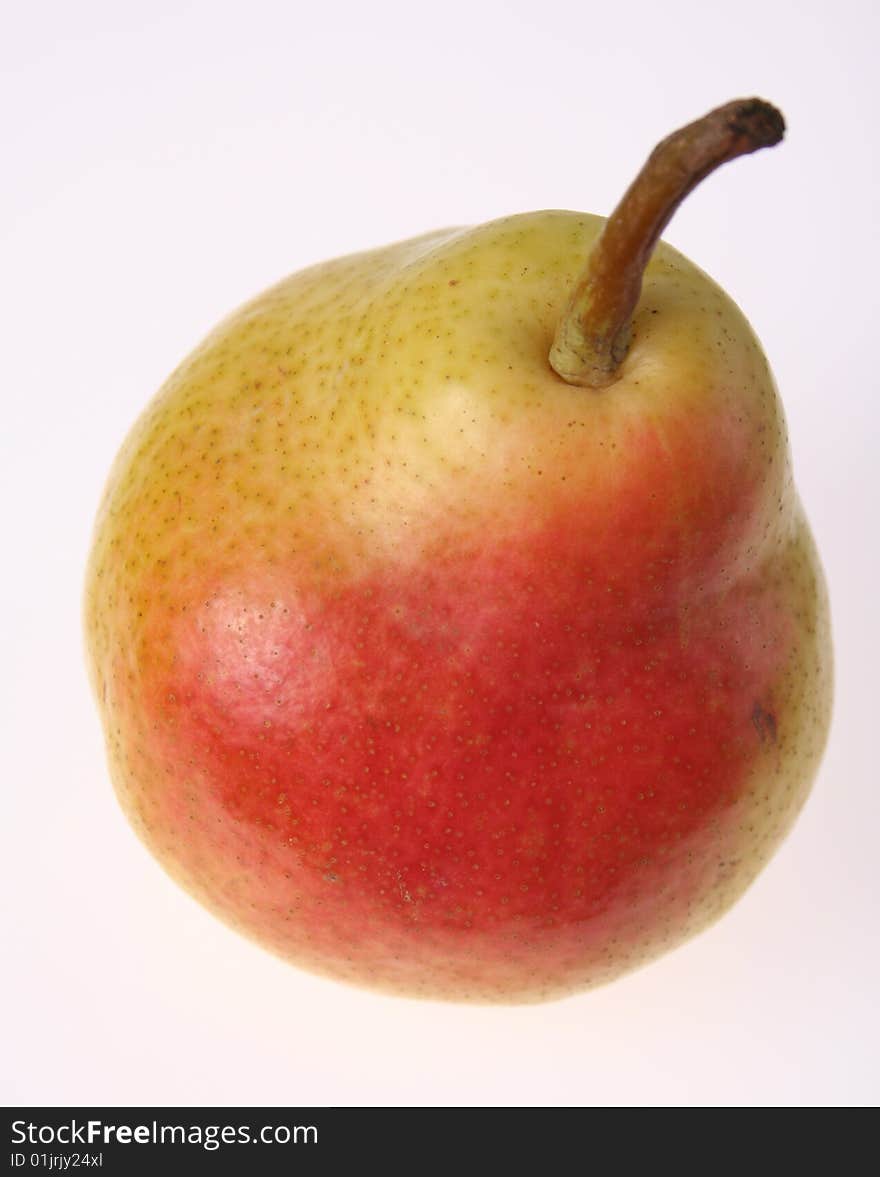 A red pear isolated on white background