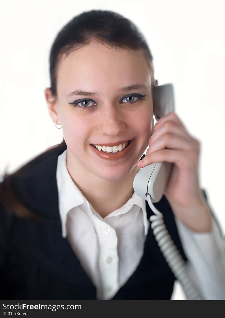 Attractive young woman calling by phone. Attractive young woman calling by phone