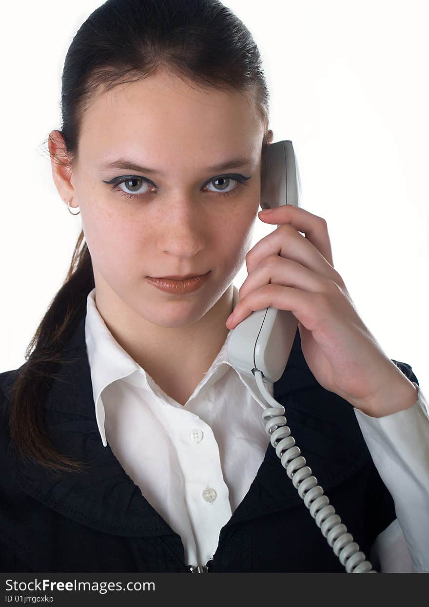 Attractive young woman calling by phone. Attractive young woman calling by phone